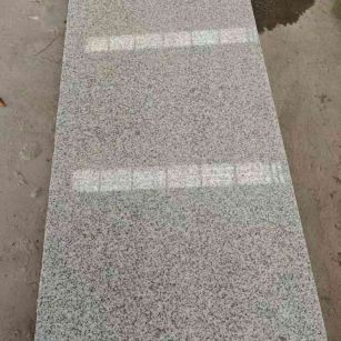 雅安芝麻白光面毛板